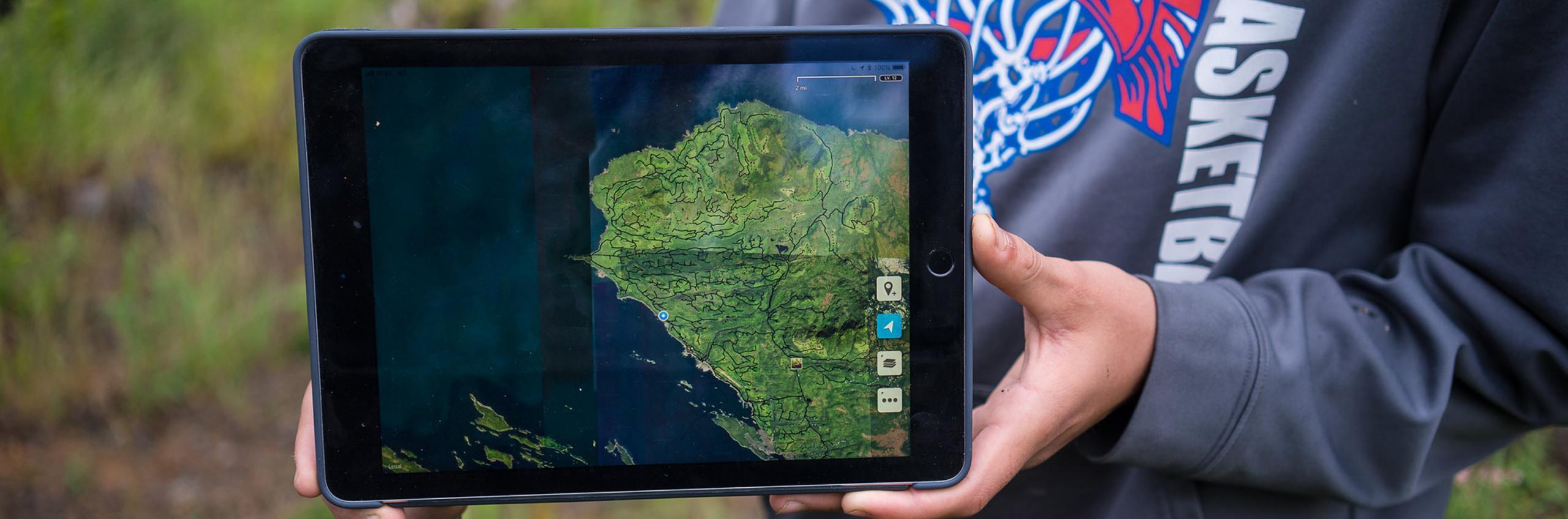 A tablet with a map on the screen.