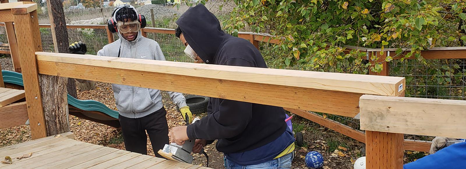 2019 participants learn carpentry skills during a field training with The Blueprint Foundation. Photo by Jason Stroman