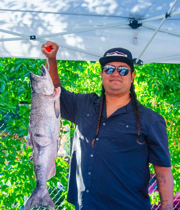 Person holding up a fish