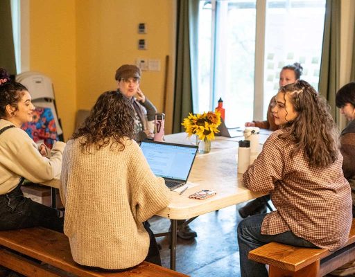 People talking at a table