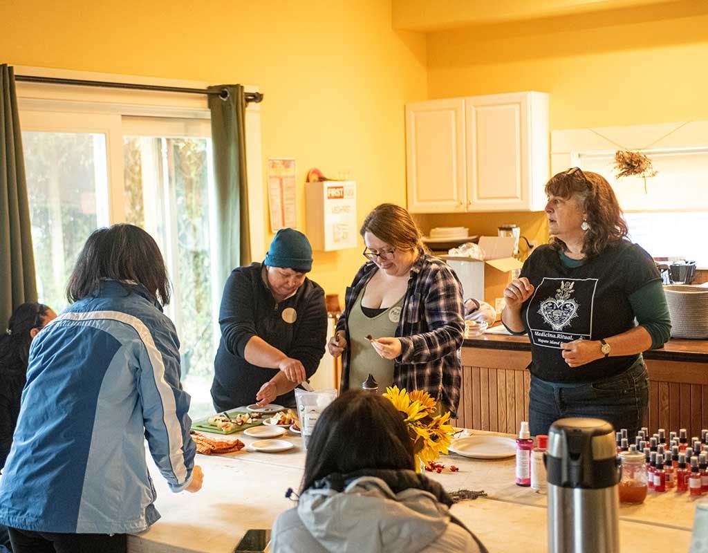 People making rose hip jam