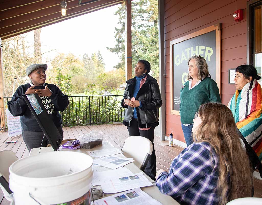 People talking on a porch