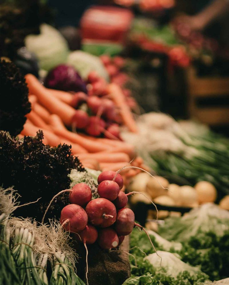 many fresh vegetables spread out in lovely display