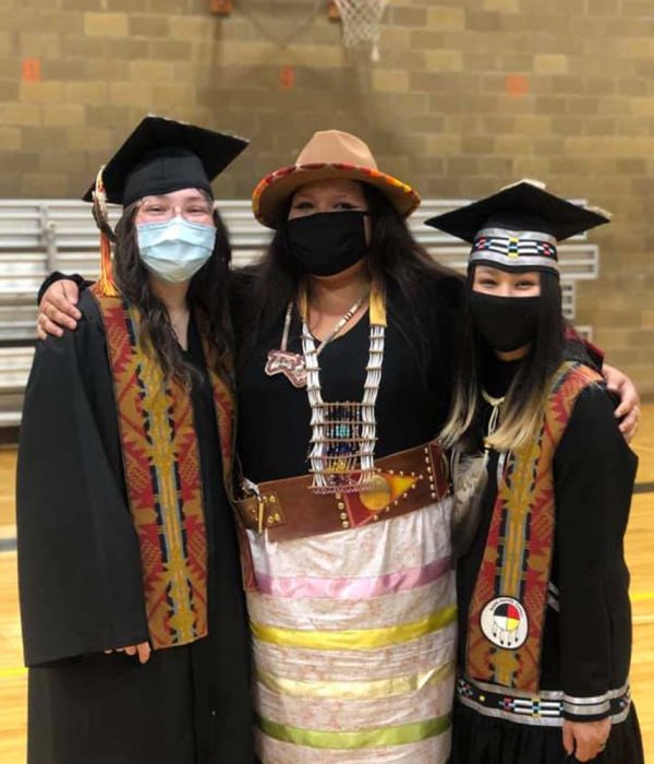 Graduates from the Many Nations Academy, a Native American alternative high school, on the NAYA campus. (Photo credit: NAYA)