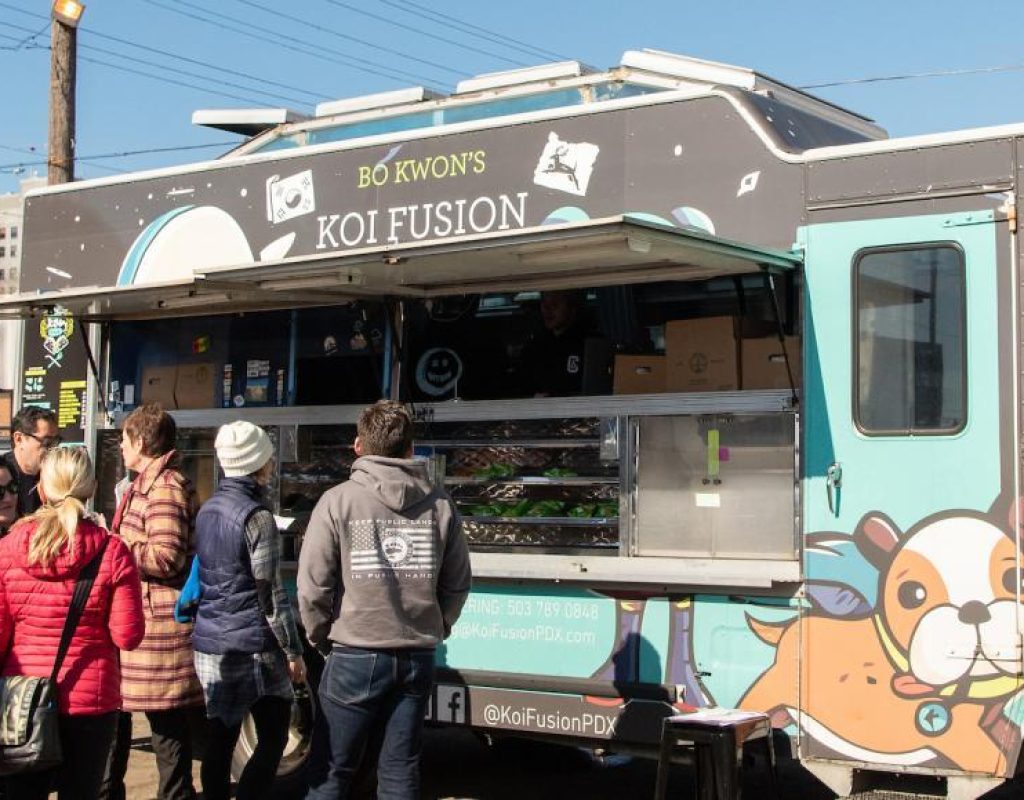 The Koi Fusion food truck serves up samples at Redd Reveal Photo By Shawn Linehan